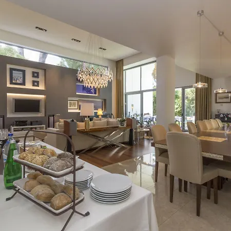 Casa Laranja Boutique House בית הארחה